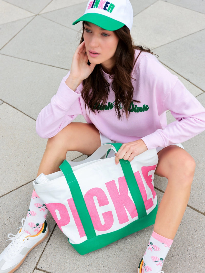 Load image into Gallery viewer, Pickle Tote with Woman Sitting on Ground
