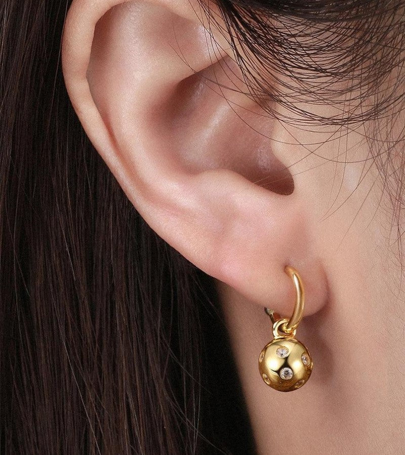 Load image into Gallery viewer, Pickleballs Hoop Huggie Earrings Gold in Ear
