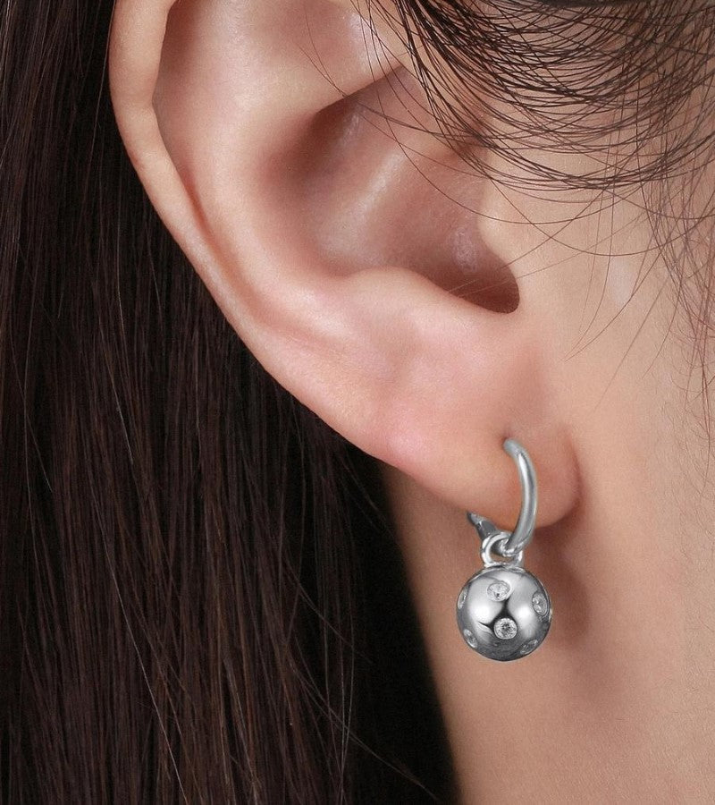 Load image into Gallery viewer, Pickleballs Hoop Huggie Earrings Silver in Ear
