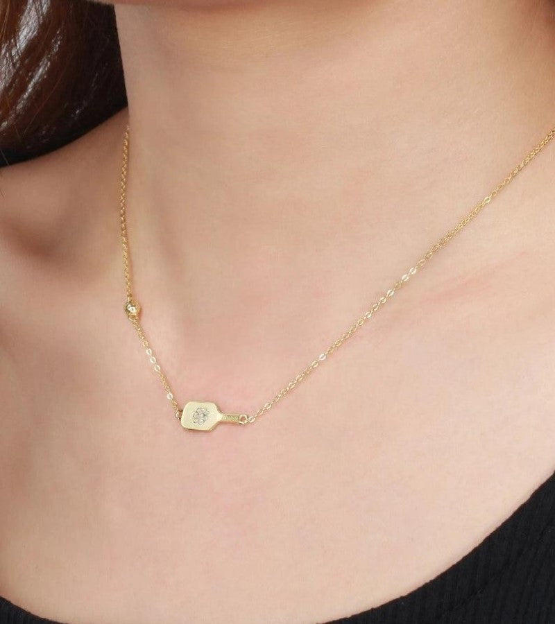 Load image into Gallery viewer, Picklebelle Danty Dinker Gold Necklace on a woman&#39;s neck
