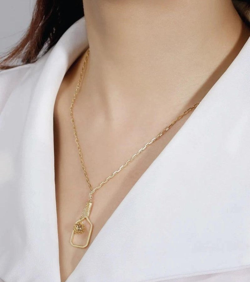 Load image into Gallery viewer, Picklebelle The Volley Gold Pickleball Necklace on a neck

