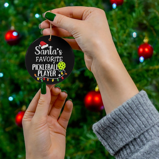 Santa's Favorite Pickleball Player Disc Ornament next to tree